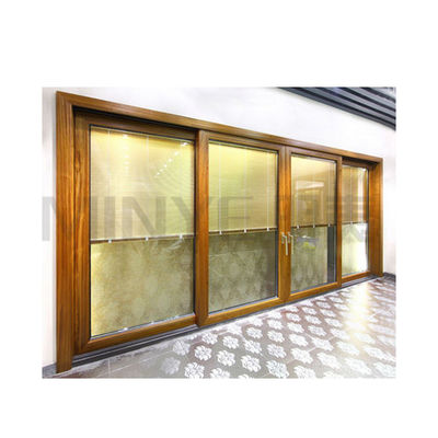 Puerta de vidrio Puertas correderas de aluminio de grano de madera con vidrio doblemente templado y buen sellado
