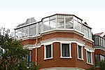 Disfrute del aire libre con comodidad con el marco de material de aleación de aluminio de la casa de cristal de la sala de sol