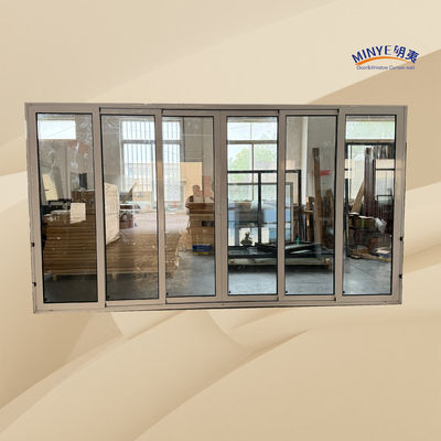 Puerta corredera de aluminio de corte térmico exterior con apilador y vidrio doble templado