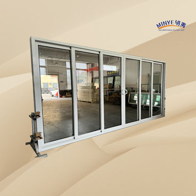 Puerta corredera de aluminio de corte térmico exterior con apilador y vidrio doble templado